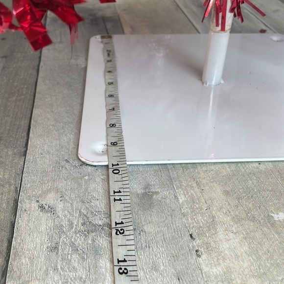 Red tinsel Christmas tree on a white metal base.  Approx 4’ tall. Light weight. - Picture 8 of 8
